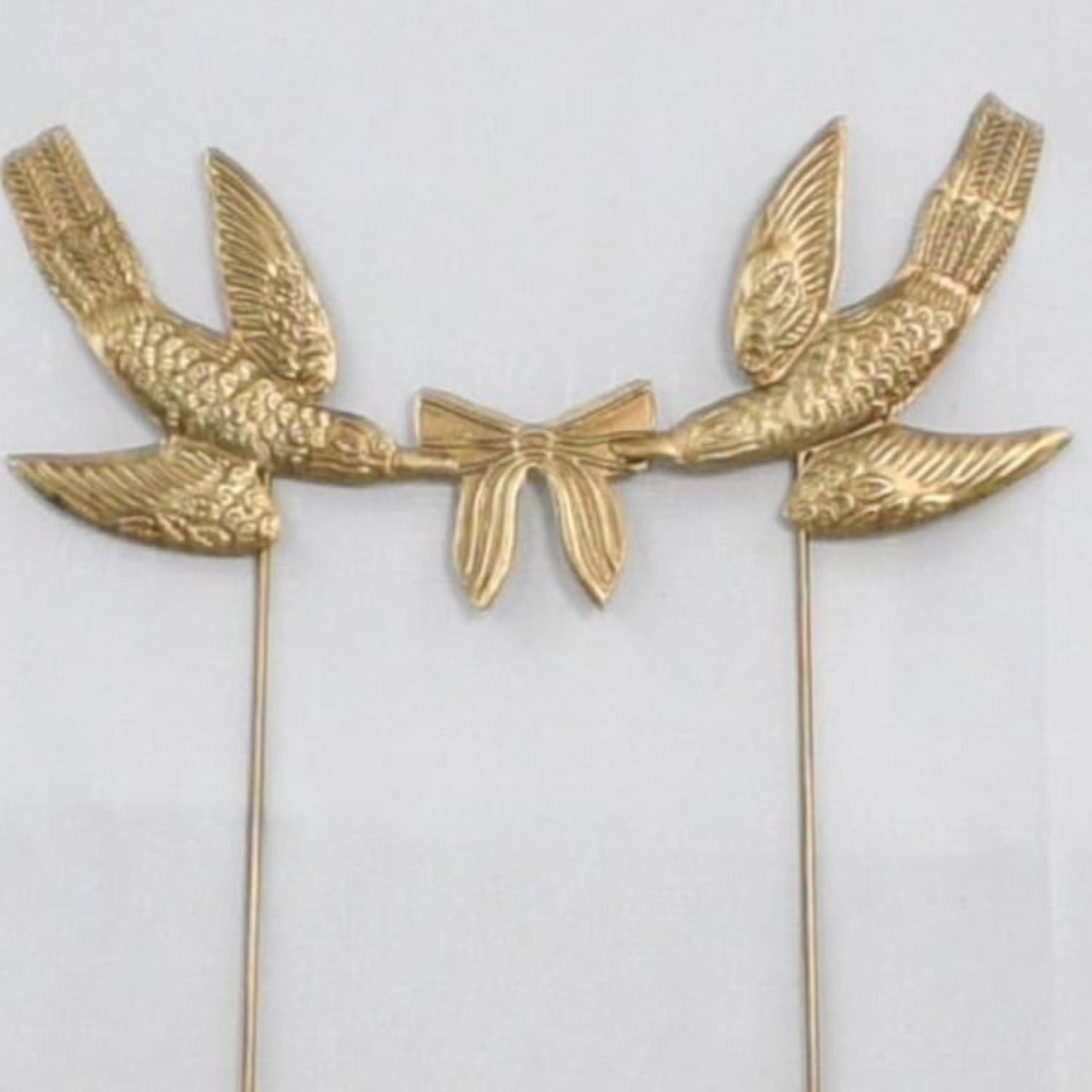 Twin Birds With Bow Stick